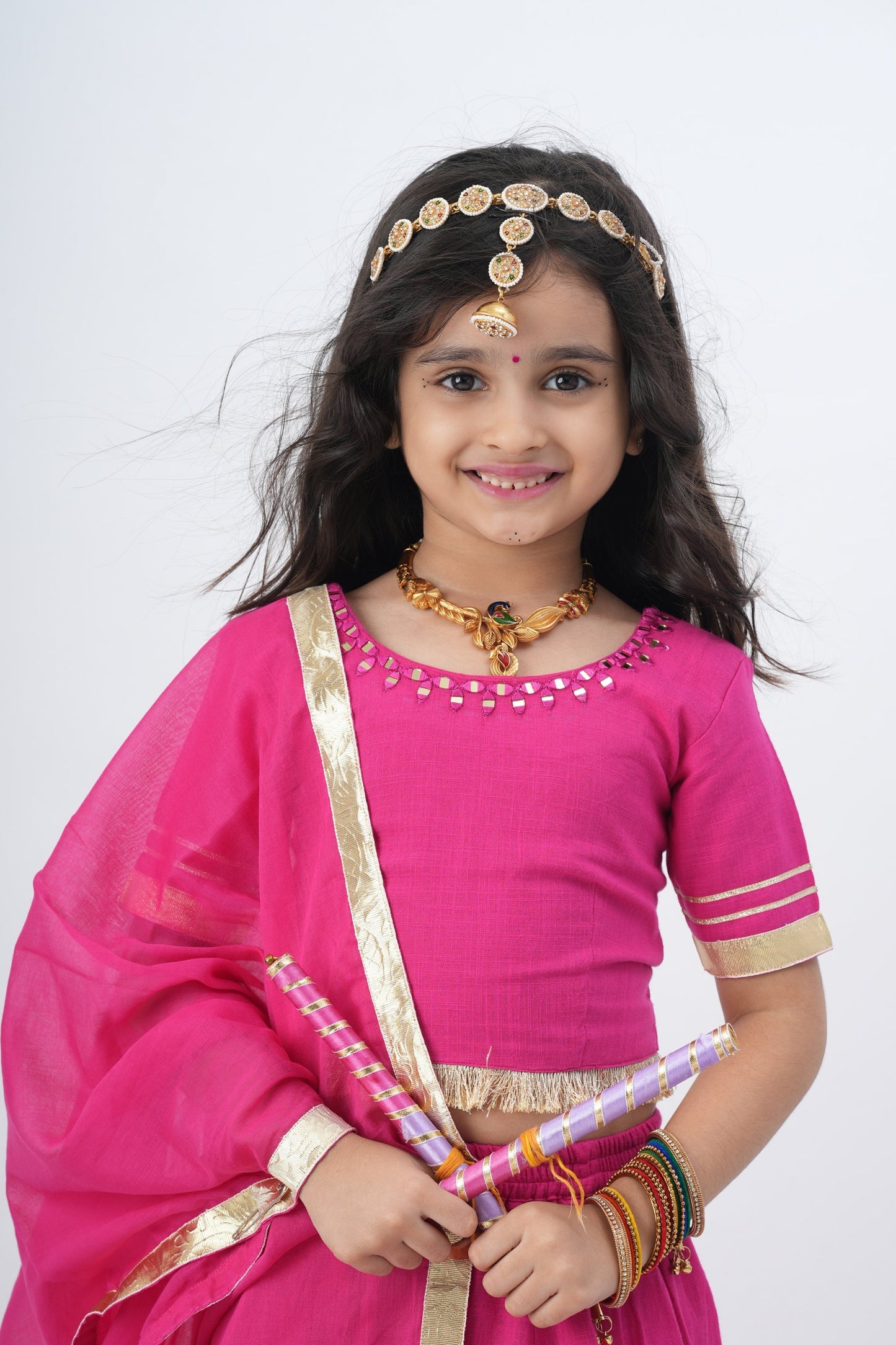 Festive Fuchsia Charm :n Kids Lehenga with Mirror Work and Golden Accents