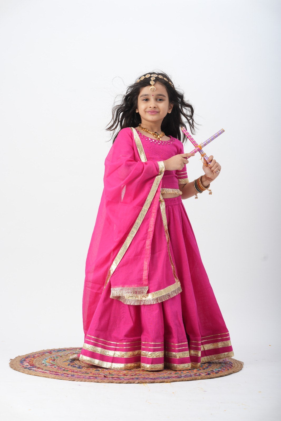 Festive Fuchsia Charm :n Kids Lehenga with Mirror Work and Golden Accents